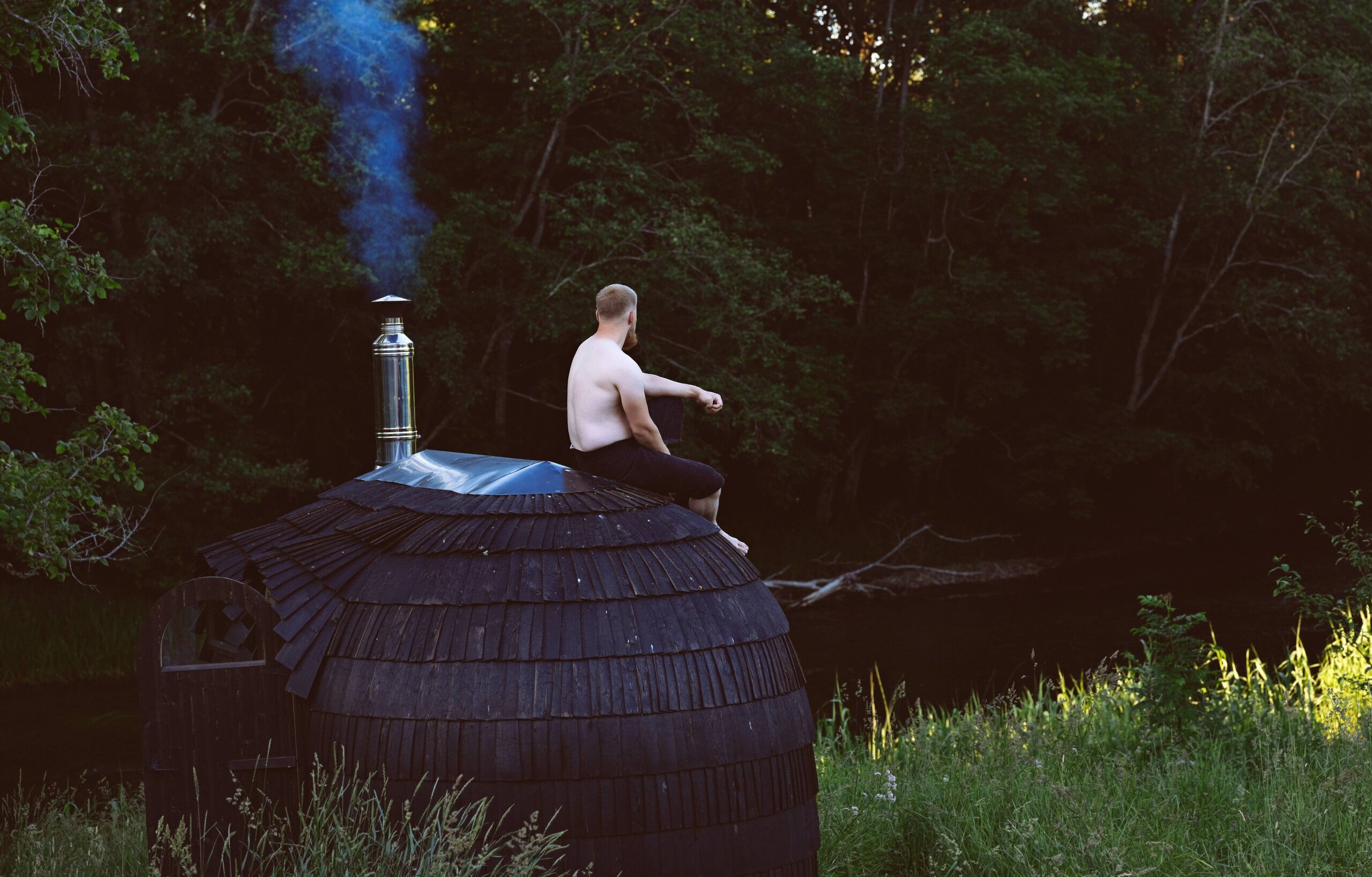 Man on top of a sauna
